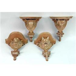 A PAIR OF CARVED WALL BRACKETS WITH FOX-HEAD SUPPORTS