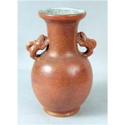 AN ORANGE CRACKLE-GLAZED PORCELAIN VASE