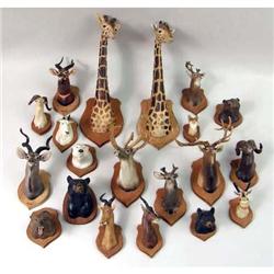 A MISCELLANEOUS GROUP OF COMPOSITION HANDPAINTED MINIATURE ANIMAL HEADS