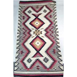 A NATIVE AMERICAN WOVEN RUG