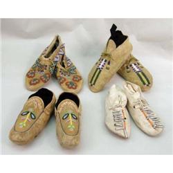 FOUR PAIRS OF INDIAN-BEADED DEERSKIN MOCCASINS