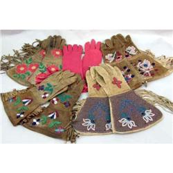 FOUR PAIRS OF INDIAN-BEADED DEERSKIN FRINGED GLOVES