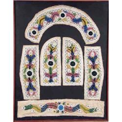 A FRAMED NATIVE AMERICAN BEADED ELEMENT FROM A CEREMONIAL IROQUOIS DRESS