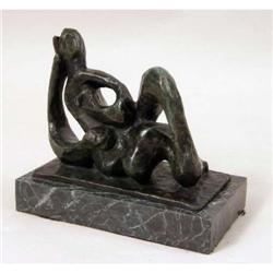 A CAST BRONZE ABSTRACT FIGURE OF A WOMAN
