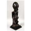 Image 1 : A CARVED AFRICAN FIGURE OF A MALE