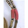 Image 4 : A DOUBLE ROLLED HAND-WROUGHT BRASS AND CORAL NECKLACE