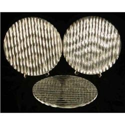 A GROUP OF NINE CIRCULAR COLORLESS GLASS PLACEMATS