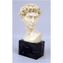 A CARVED COMPOSITION BUST OF MICHELANGELO`S DAVID