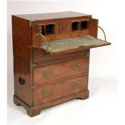 A HARDWOOD ANGLO-INDIAN CAMPAIGN CHEST AND BUTLER`S DESK
