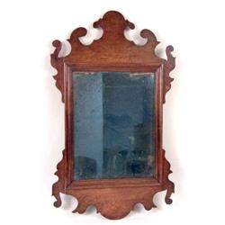 A CHIPPENDALE MAHOGANY LOOKING GLASS
