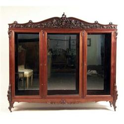 A VICTORIAN CARVED MAHOGANY BOOKCASE