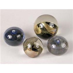A GROUP OF FOUR PAPERWEIGHTS