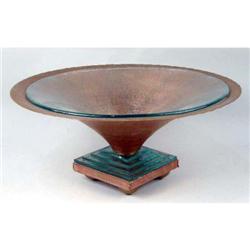 A FOOTED COPPER COMPOTE