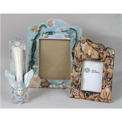 TWO POLYCHROME-DECORATED PARCEL-GILT CERAMIC PICTURE FRAMES