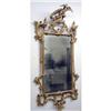 Image 1 : A ROCOCO CARVED PINE GILTWOOD LOOKING GLASS