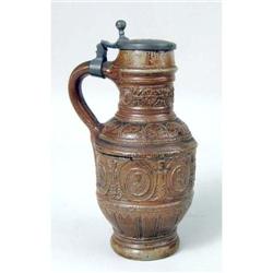 A WESTERWALD PEWTER-MOUNTED GLAZED STONEWARE JUG