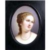 Image 1 : AN OVAL FRAMED PORCELAIN PLAQUE OF A LADY WITH PEARLS