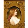 Image 2 : AN OVAL PORCELAIN PLAQUE OF A MAIDEN WITH A MAROON BOW
