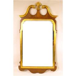 A GEORGE III STYLE GILT-DECORATED LOOKING GLASS