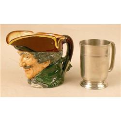 A POLYCHROME DECORATED TOBY PITCHER