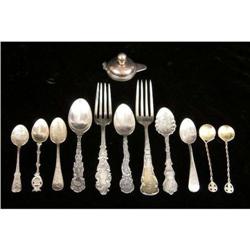 EIGHT STERLING SILVER SOUVENIR SPOONS