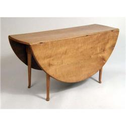 A QUEEN ANNE FIGURED MAPLE DROP LEAF TABLE