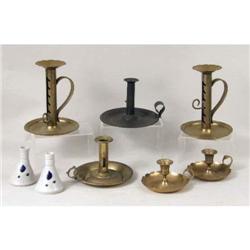 A GROUP OF ASSORTED CANDLE HOLDERS