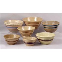 AN ASSORTED GROUP OF YELLOWWARE BOWLS