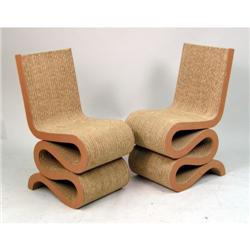 A PAIR OF LAMINATED CARDBOARD AND MASONITE "WIGGLE" CHAIRS