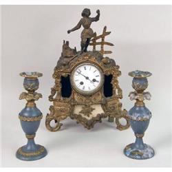 A LOUIS XV STYLE GILT METAL MANTLE CLOCK