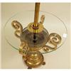 Image 2 : A BRASS AND GLASS FLOOR LAMP TABLE