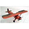 Image 1 : A RED- AND BLACK-PAINTED MODEL AIRPLANE