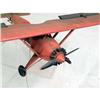 Image 3 : A RED- AND BLACK-PAINTED MODEL AIRPLANE