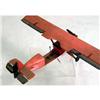 Image 4 : A RED- AND BLACK-PAINTED MODEL AIRPLANE