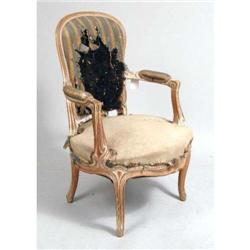 A LOUIS XV-STYLE CARVED BEECHWOOD FAUTEUIL