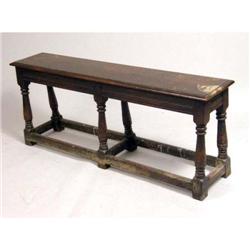 AN ELIZABETHAN STYLE TURNED OAK STRETCHER-BASE JOINT STOOL