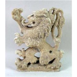 A STONEWARE FIGURE OF A LION RAMPANT