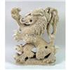 Image 1 : A STONEWARE FIGURE OF A LION RAMPANT
