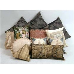 AN ASSORTED GROUP OF PILLOWS