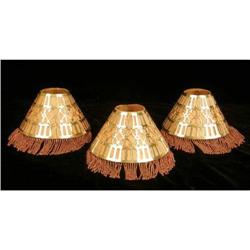A SET OF THREE PIERCED SILVER PLATED BOUDOIR LAMP SHADES