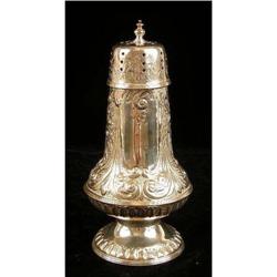 A SILVER ON COPPER SUGAR SHAKER