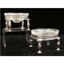 A PAIR OF TIFFANY & COSTERLING SILVER FOOTED CIRCULAR SWEETMEAT DISHES WITH MOLDED GLASS INSERTS