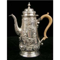 A CONTINENTAL SILVER PLATED COFFEE POT