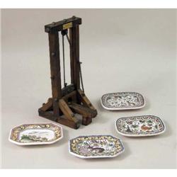 A WOOD AND PATINATED METAL CIGAR GUILLOTINE