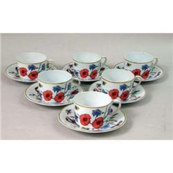 A SET OF SIX HAVILAND LIMOGES PORCELAIN FLORAL DECORATED CUPS AND SAUCERS