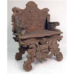 A RENAISSANCE REVIVAL CARVED OAK GREAT CHAIR