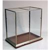 Image 1 : A GLASS AND MOLDED METAL DISPLAY CABINET
