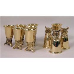 A GROUP OF BRASS FOX HEAD STIRRUP CUPS