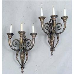 A PAIR OF SILVER PLATED THREE LIGHT WALL SCONES