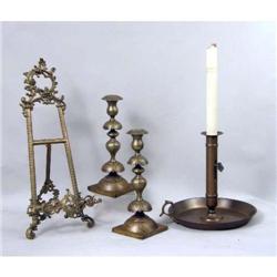 A BRASS CANDLESTICK OF IMPRESSIVE SIZE